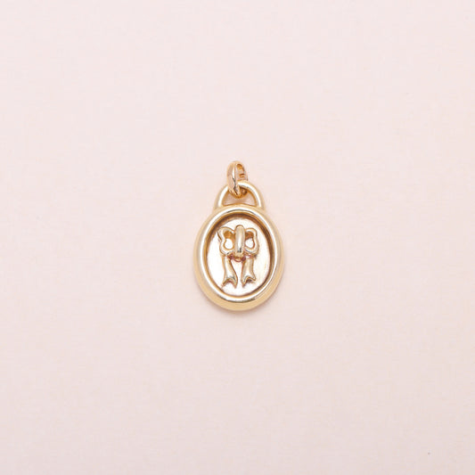 Sweet Oval-Framed Bow Charm Necklace 14K Solid Gold