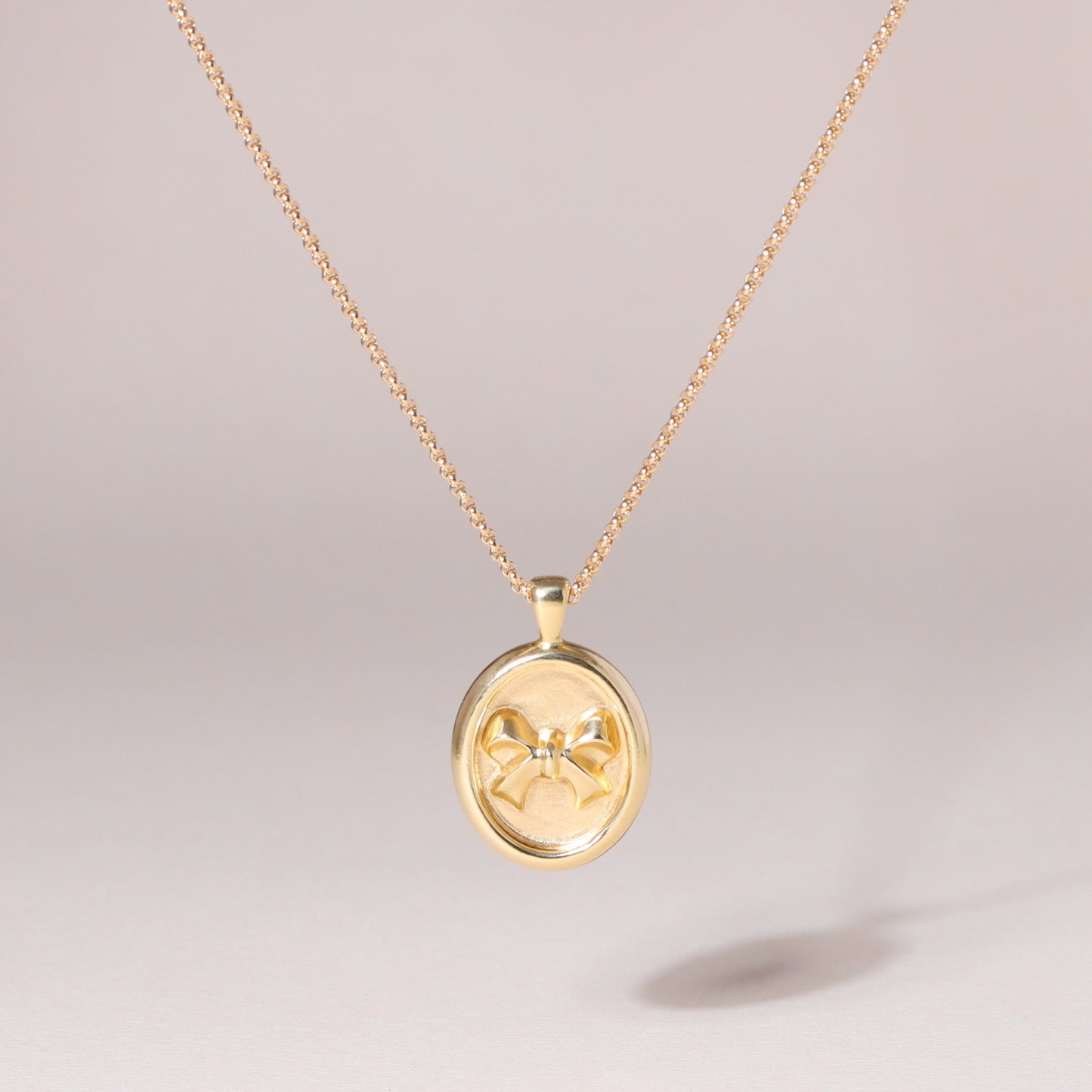 Oval-Framed Bow Charm Necklace 14K Solid Gold