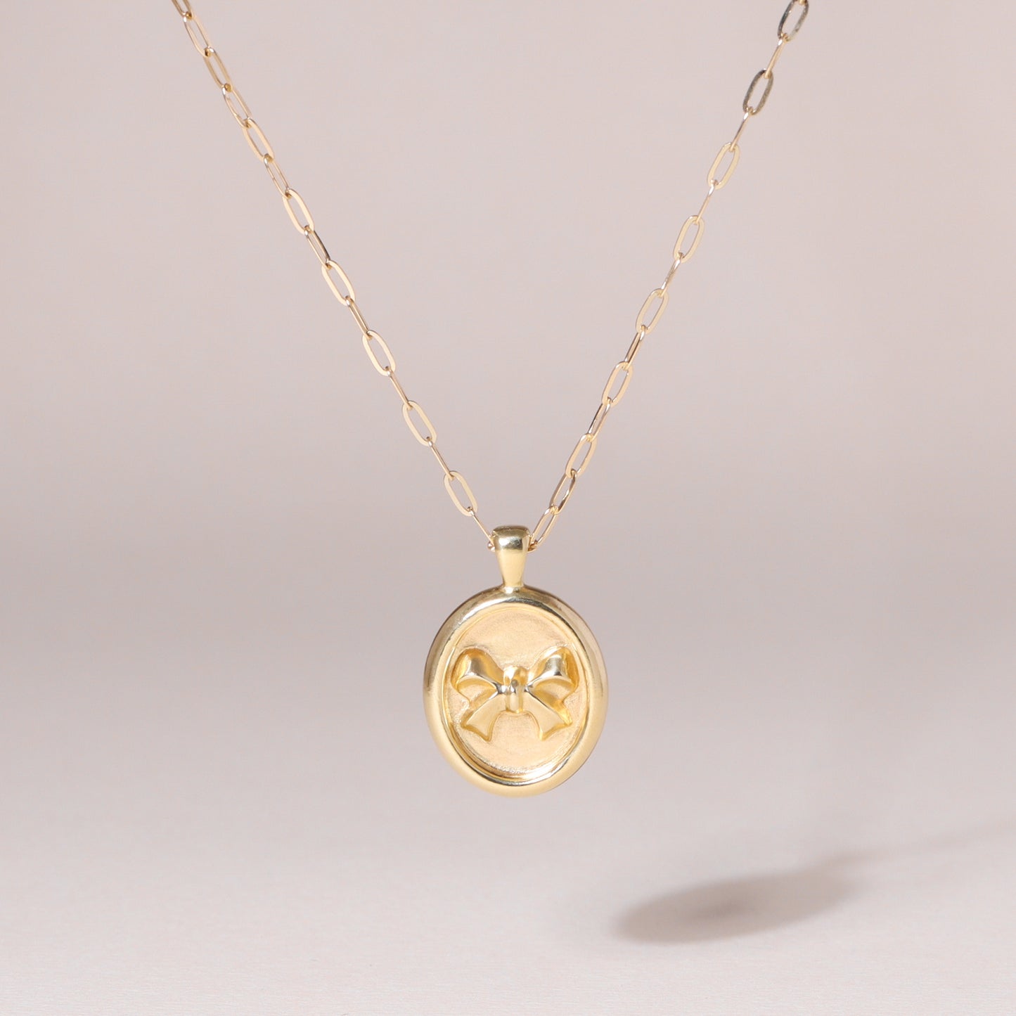 Oval-Framed Bow Charm Necklace 14K Solid Gold