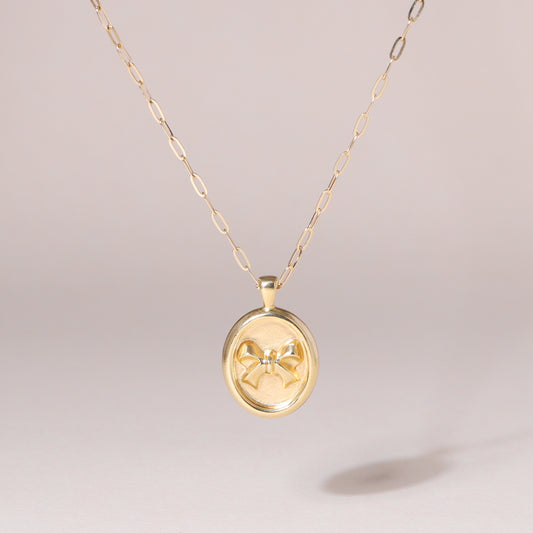 Oval-Framed Bow Charm Necklace 14K Solid Gold