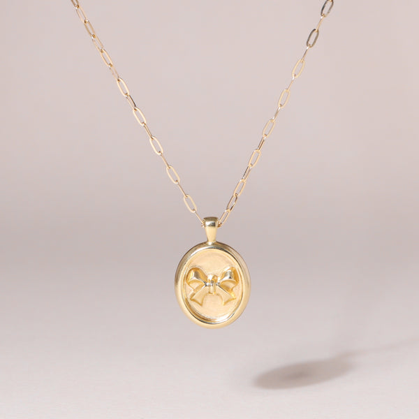Oval-Framed Bow Charm Necklace 14K Solid Gold