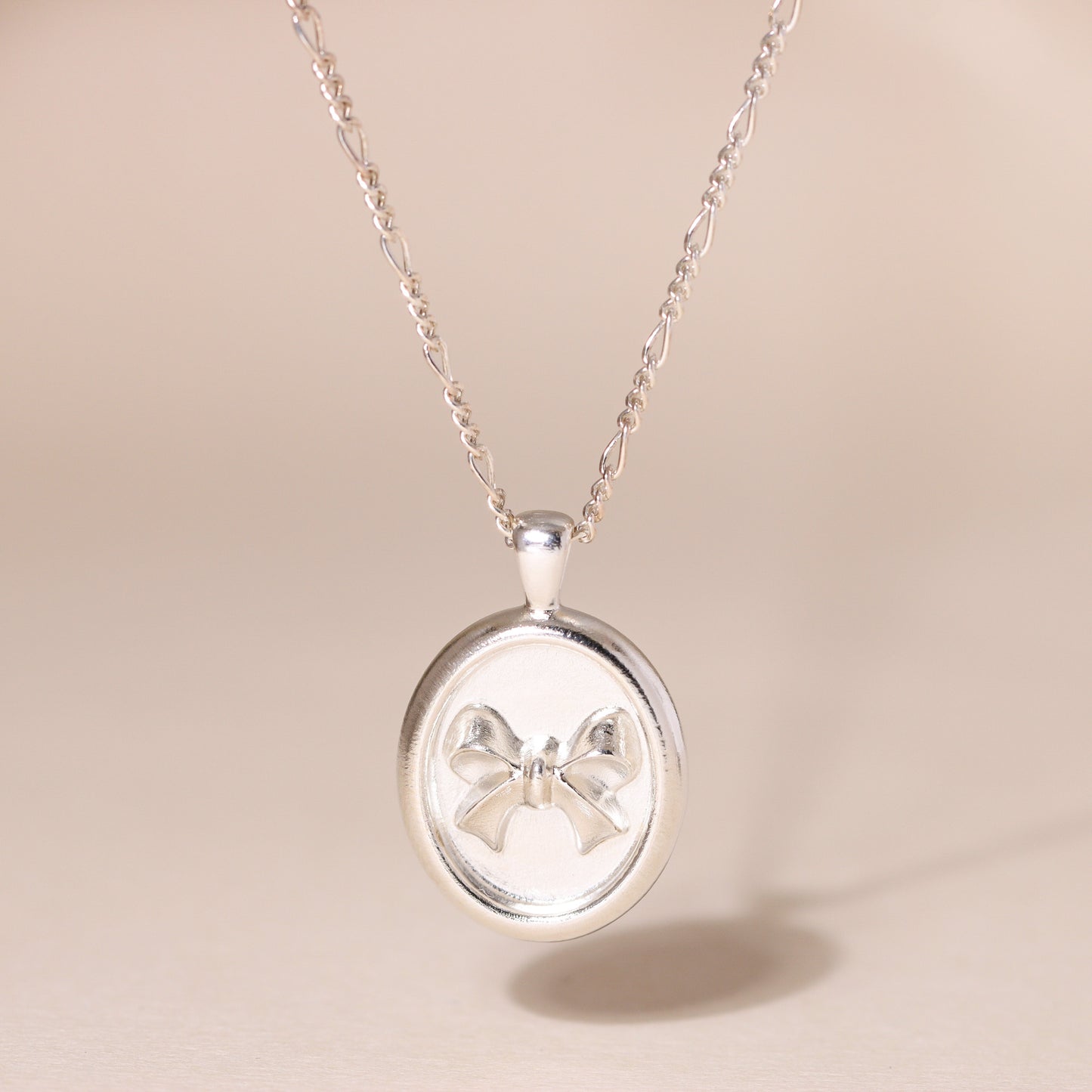 Oval-Framed Bow Charm Necklace