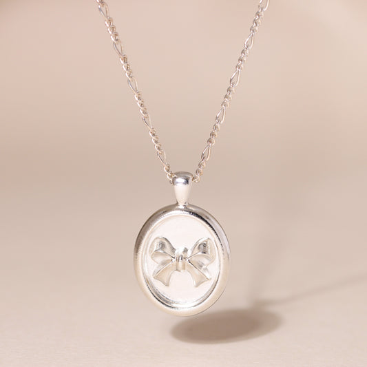 Oval-Framed Bow Charm Necklace