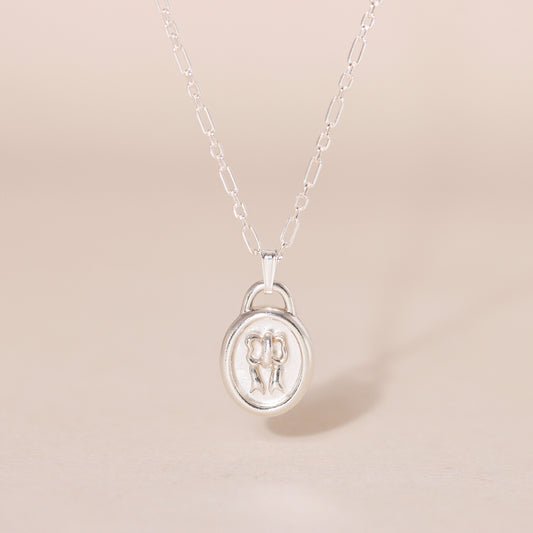 Sweet Oval-Framed Bow Charm Necklace